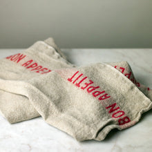 Load image into Gallery viewer, Charvet Editions Bon Appetit Tea Towel in Linen Red