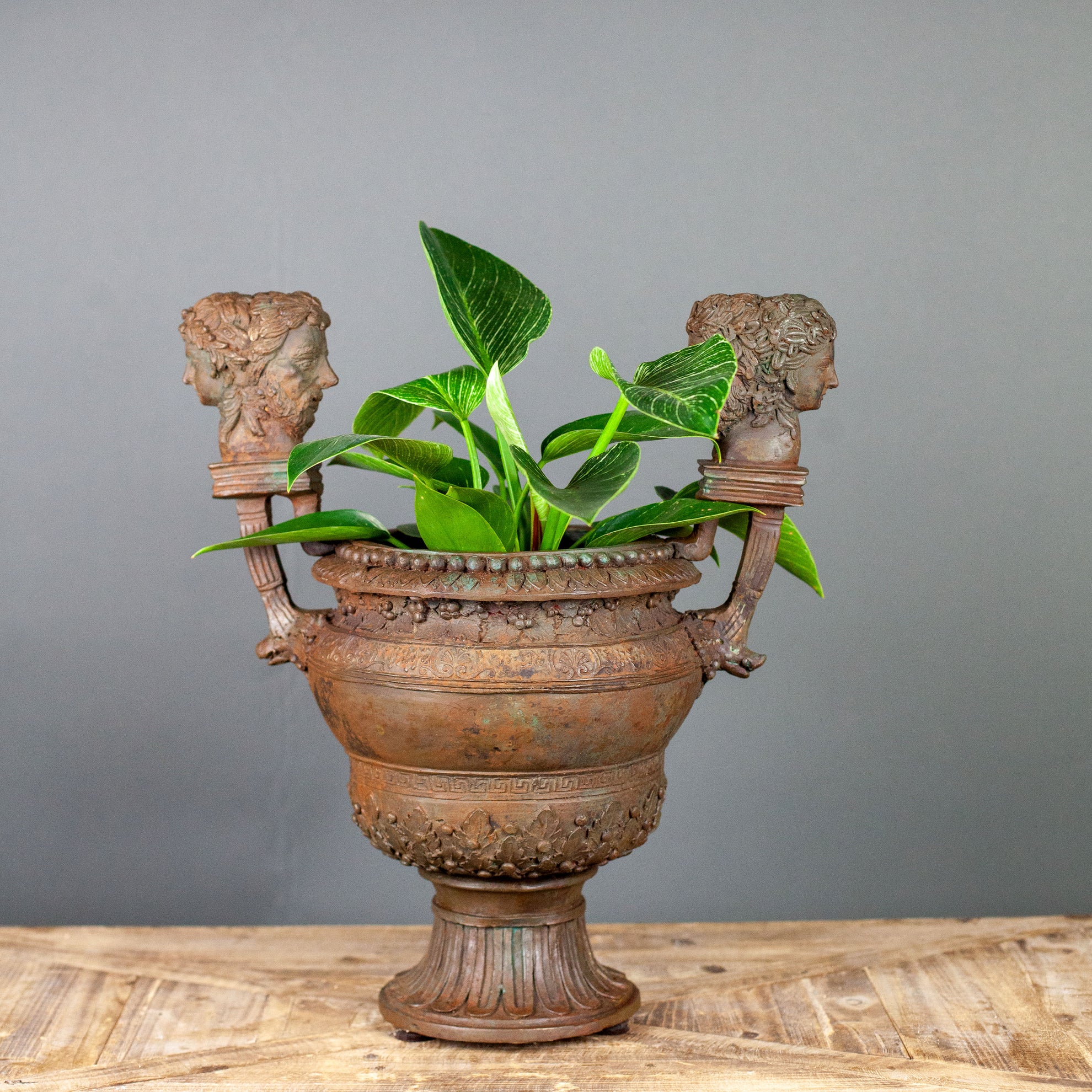 Classical Roman Cast Bronze Handled Urn with Faces